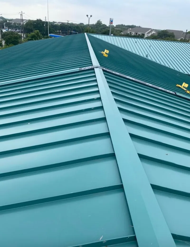Green commercial metal roof ridge and valley for Metal Roof Repair in Deming